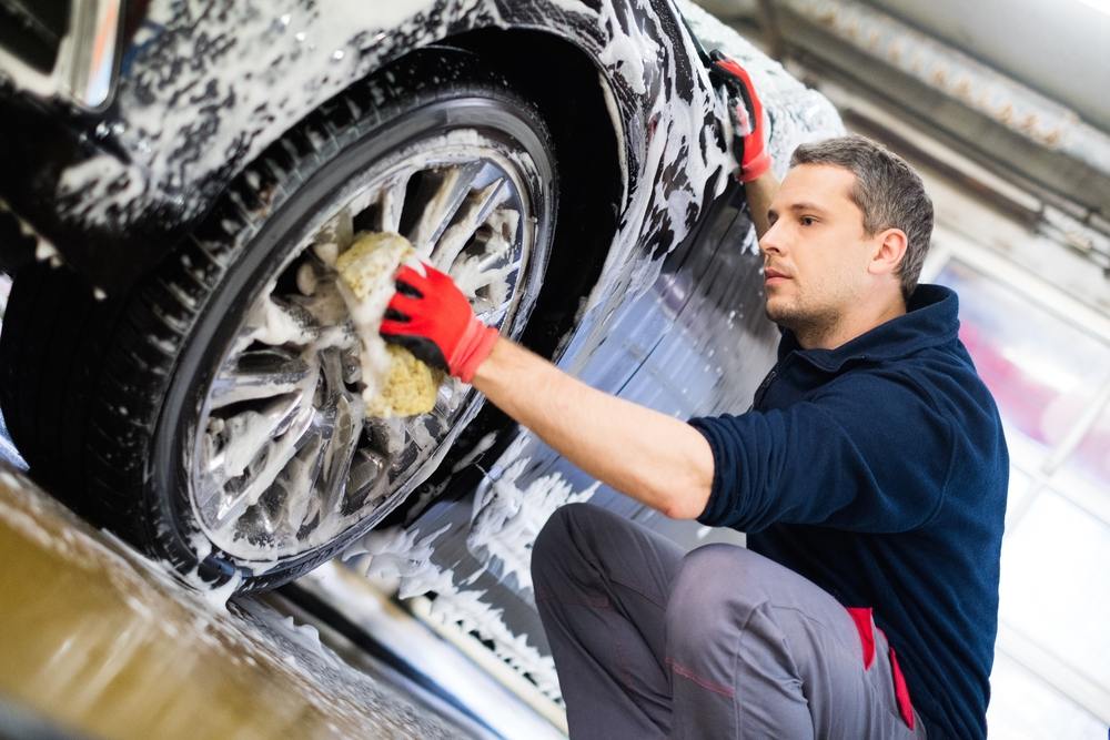 Man,Worker,Washing,Car,Service,With,Foam,And,Sponge.,Car